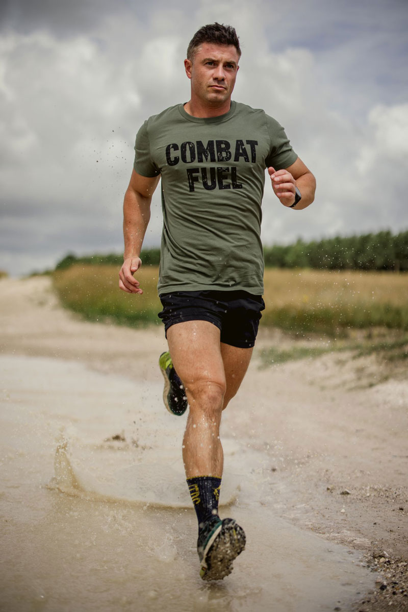 A picture of the coach running in water